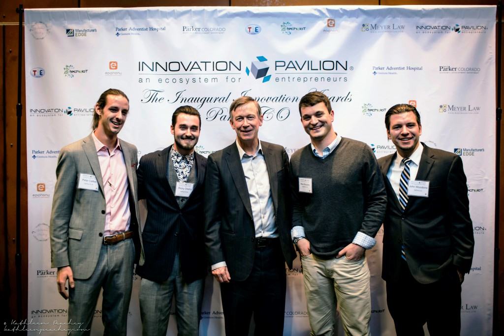 GoFire team with Governor Hickenlooper.  Photo courtesy of Kathleen Peachey Photography