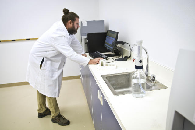 mkb091715c/biz/Marla Brose/091715 Dr. Scot Waring, lab director at Steep Hill Labs, Inc., works on testing a cannabis sample in one of the labs at Steep Hill, Inc., a cannabis testing and analysis lab in Albuquerque, N.M. (Marla Brose/Albuquerque Journal)